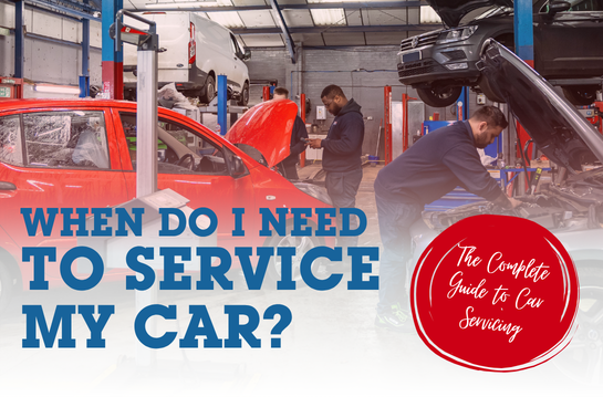 Image reads "When Do I Need to Service My Car?" "The Complete Guide to Car Servicing" and includes a photo of K Brown Auto Repairs King's Lynn workshop with technicians working on vehicles